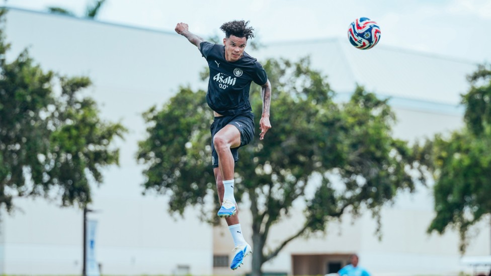 AIR WE GO: Nico O'Reilly powers in a header.