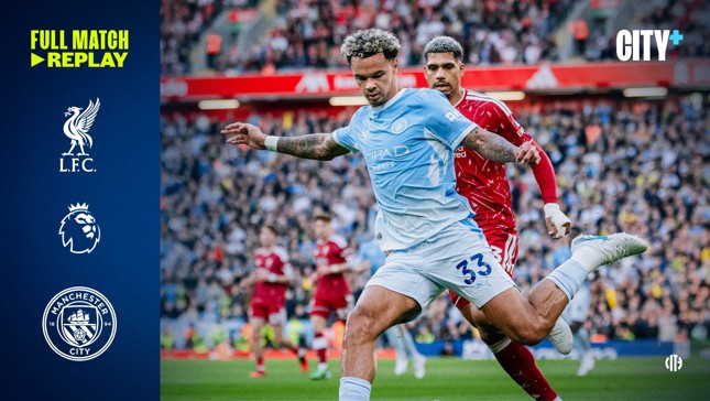 Football match action between Liverpool and Manchester City in the Premier League, featuring players in motion on the field. Logos for Liverpool, Manchester City, Premier League, and City+ displayed on the sides.