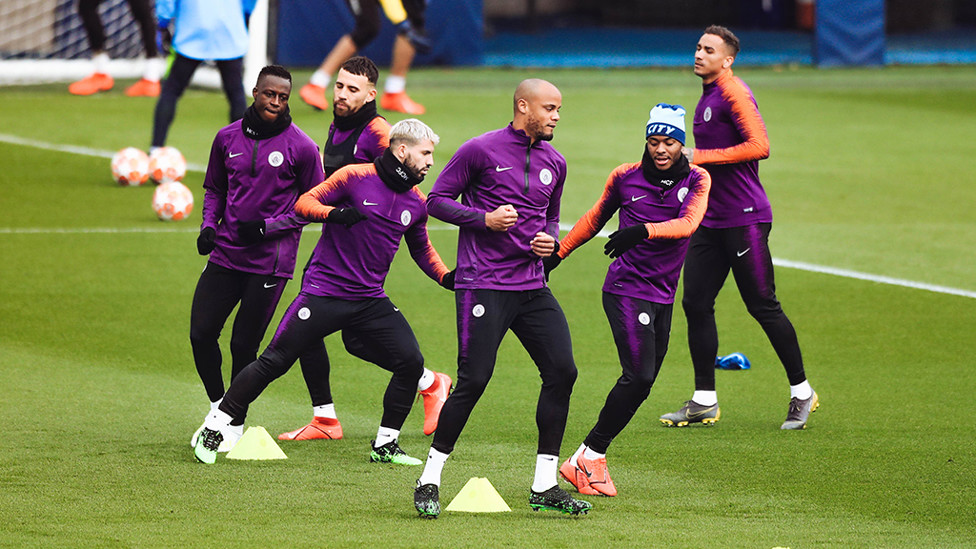 NICE MOVE SKIP : Raheem keeps a close eye on Vincent Kompany's feet