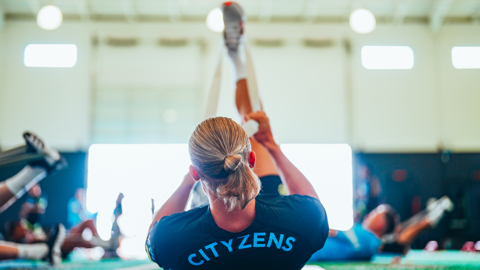 BANDING TOGETHER : The team test their flexibility