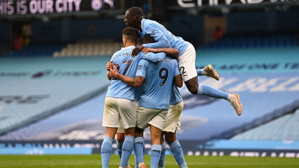 CELEBRATION: Raz is mobbed after opening the scoring