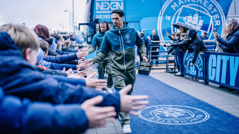 DUTCH DUO : Reijnders and Ake greet fans on the way into the stadium.