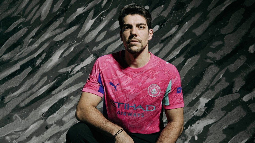 HOME GOALKEEPER TOP : Stefan Ortega Moreno sports the pink shirt