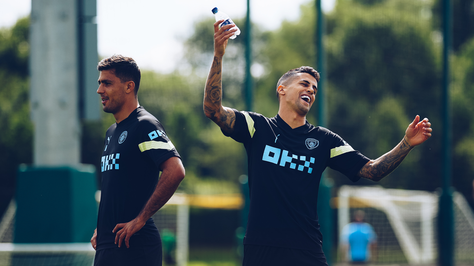 ALL SMILES : Joao Cancelo and Rodrigo were in great spirits during Monday's session