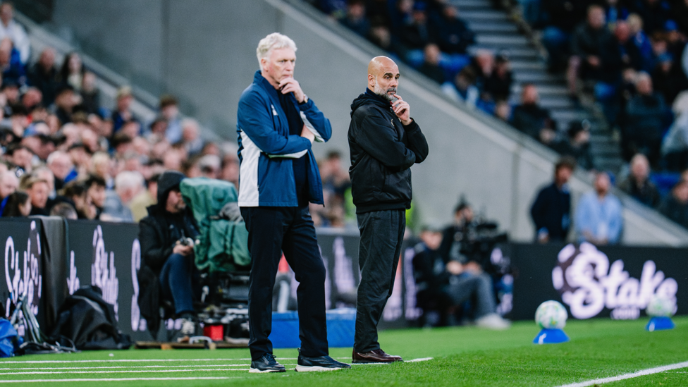 WATCHING BRIEF : The managers watch on from the touchline.