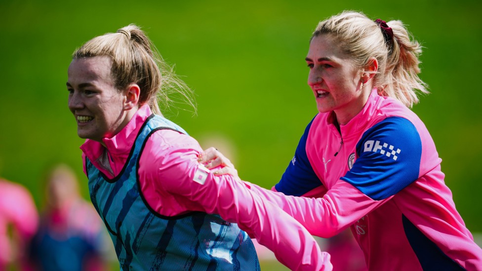 TOUCH TIGHT : Lauren Hemp is closely watched by Laura Coombs