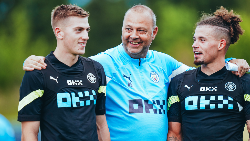 THREE'S A CROWD : Rodolfo Borrell gives Liam Delap and Kalvin Phillips a hug