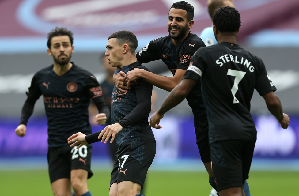 LEVEL BEST: Phil Foden is mobbed by his team mates after scoring