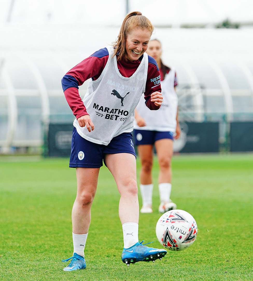 ALL SMILES : Something funny sparked a giggle mid-way through the session.