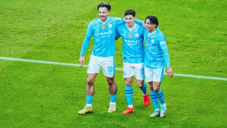 TERRIFIC TRIO: Lewis and Grealish celebrate with Alvarez.