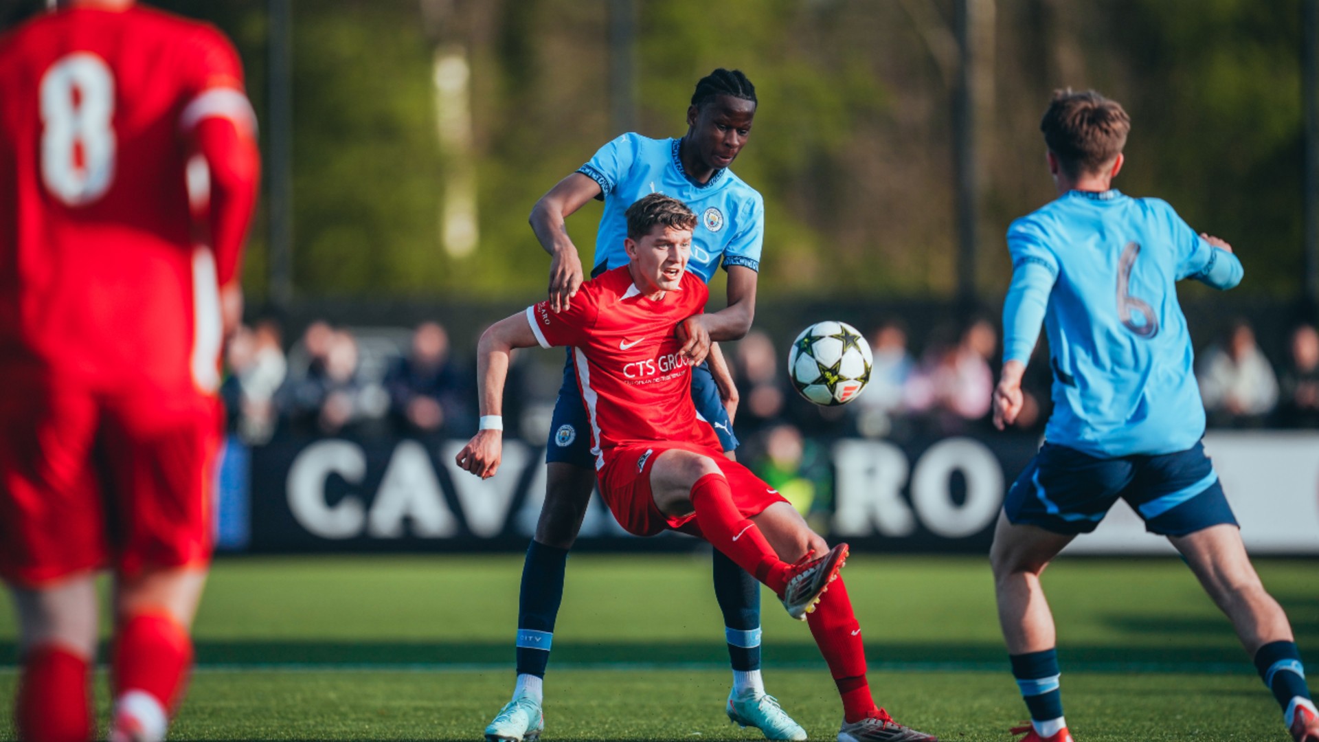 TEAMWORK : Stephen Mfuni and Charlie Gray work together to regain possession.