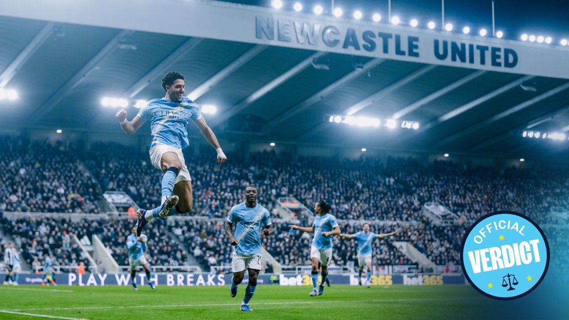 A soccer player in a light blue kit jumps in celebration at Newcastle United's stadium, with a logo saying 'Official Verdict' in the corner.