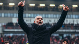 THE BOSS: Applauds the travelling fans.