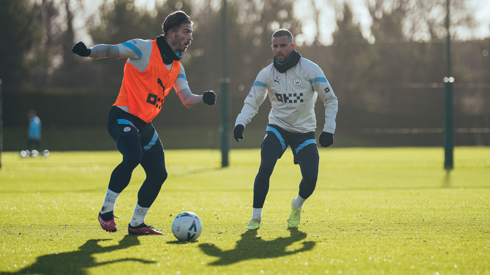 ENGLAND TEAM-MATES : Grealish and Walker come up against each other on the wing