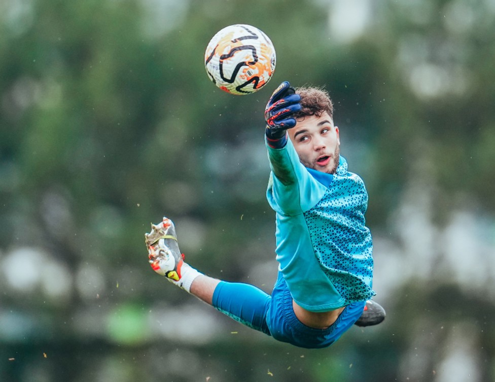 HIGH FLIER: Goalkeeper True Grant takes to the CFA skies.
