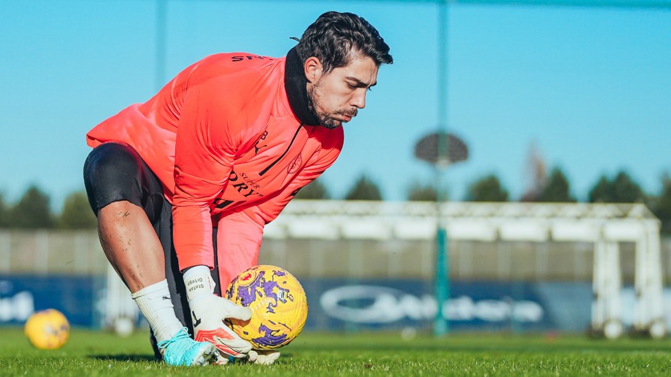SAFELY POUCHED : Stefan Ortega Moreno watches the ball into his hands