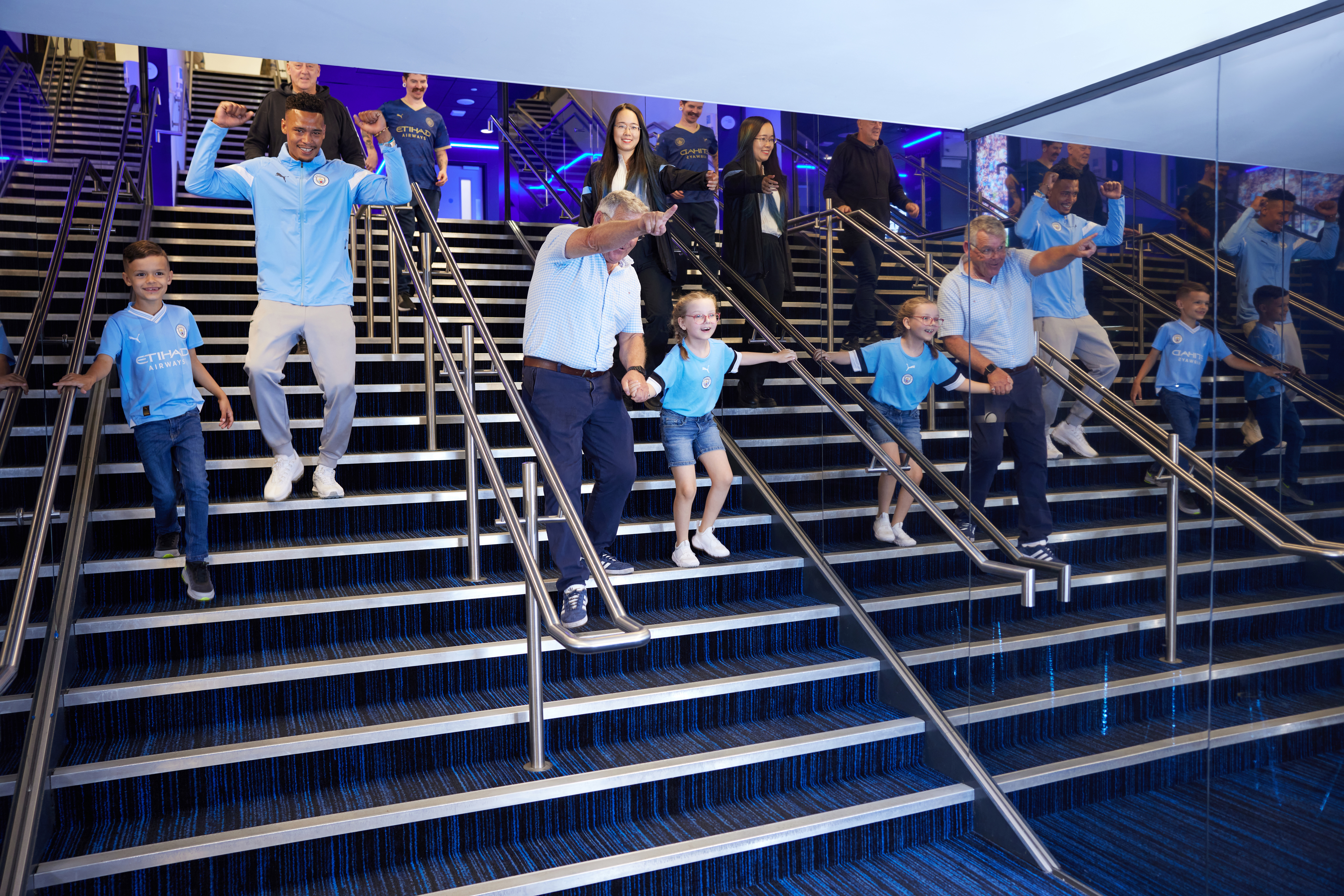 Fans walking down the stairs of the Tunnel 