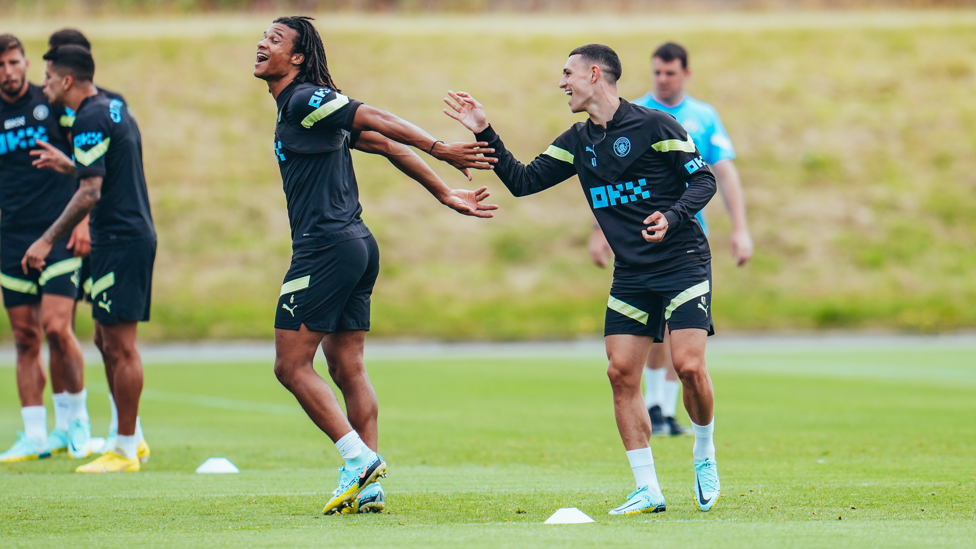 ALL SMILES : Phil Foden and Nathan Ake were in great spirits during Wednesday's session