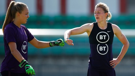 FIST BUMP: Ellie Roebuck in England training with Ellen White.