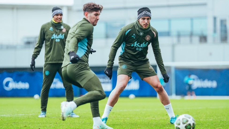 ON THE BALL : John Stones switches the play under pressure from Nico