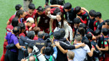 LAYING DOWN THE LORE: Manager Nualphan Lamsam gives instructions to the Thailand players in a team huddle prior to the 2019 Women's World Cup group F match with Sweden