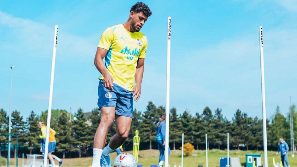 DODGE AND WEAVE : Matheus Nunes makes his way around the poles. 