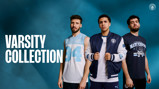 Three individuals modeling Manchester City varsity-themed apparel, including a sleeveless jersey, a jacket, and a T-shirt, against a blue background. 'VARSITY COLLECTION' text is prominently displayed.