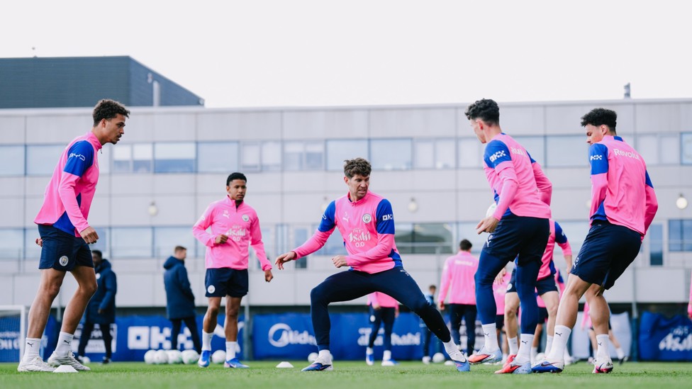 STRETCHING FOR IT: John Stones looking to intercept the ball
