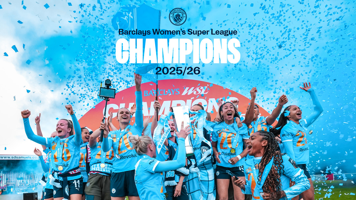 Manchester City Women's team celebrating their 2025/26 Barclays Women's Super League championship win with confetti in the background.