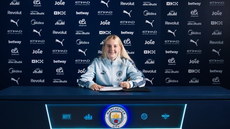 Davies signs first professional deal