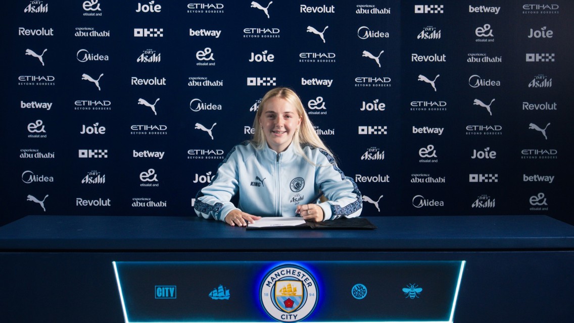 Davies signs first professional deal