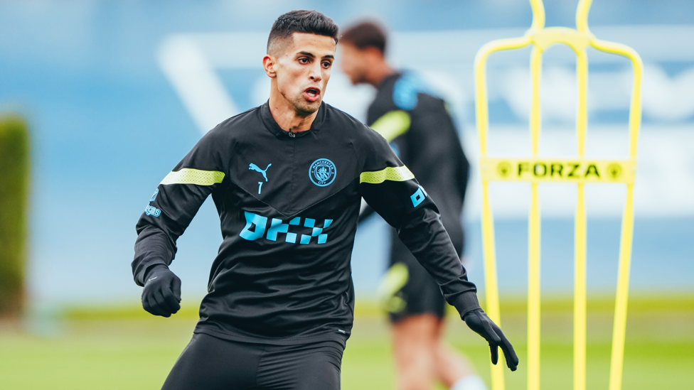 Joao Cancelo working hard
