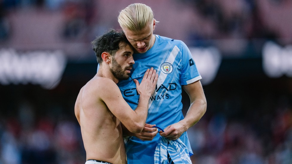 Warm hug : Erling Haaland and Bernardo Silva after our draw at Arsenal