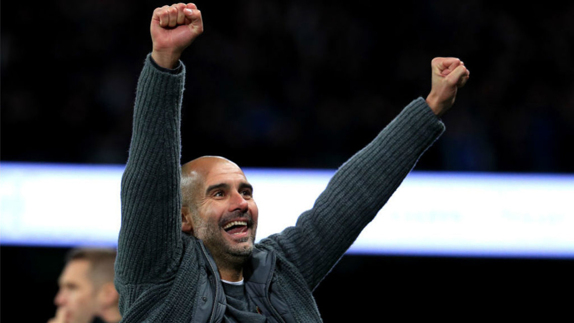 SUPER SUNDAY: Pep Guardiola celebrates a superb derby win 