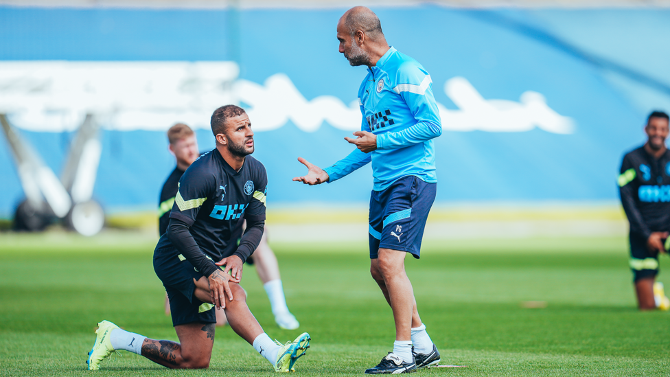 GUARDIOLA'S GUIDANCE : Pep has a chat with Kyle Walker