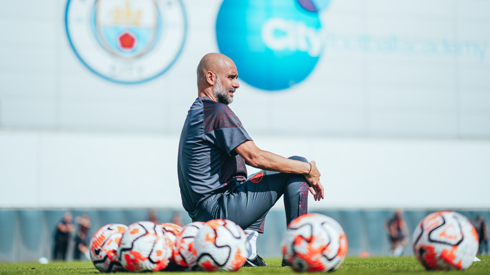 IN THE HOT SEAT : Pep watches his players