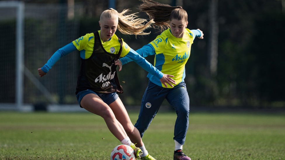 MIDFIELD BATTLE  : Laura Blindkilde Brown and Jess Park compete for the ball. 