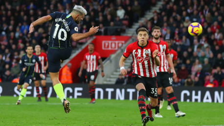 UP AND AT 'EM: Sergio Aguero leaps to head home our third goal in first half injury time
