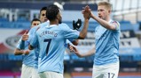 SHARE THE LOVE: The players flock to Sterling to congratulate him after the opener.