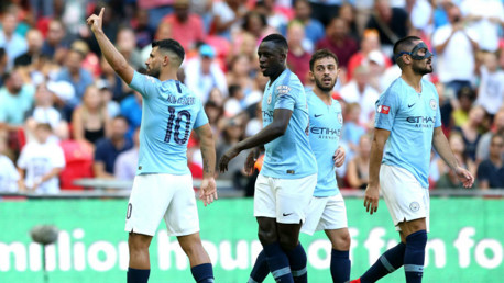 LETHAL WEAPON: Sergio Aguero acknowledges the City fans after his second goal of the afternoon