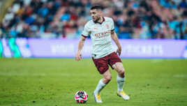 Win a signed Kovacic shirt!