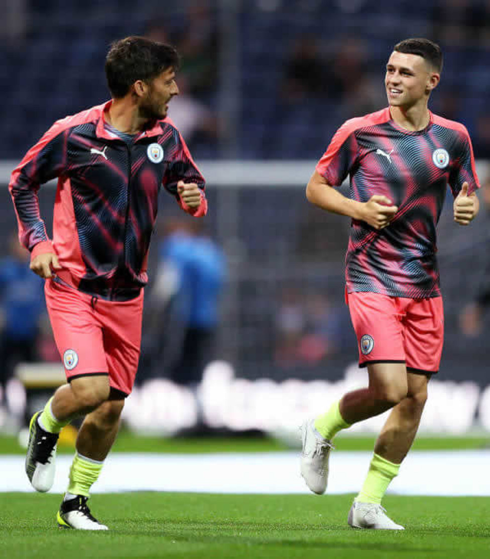 CREATIVE FORCE : Skipper David Silva and Phil Foden warm-up prior to kick off at Deepdale