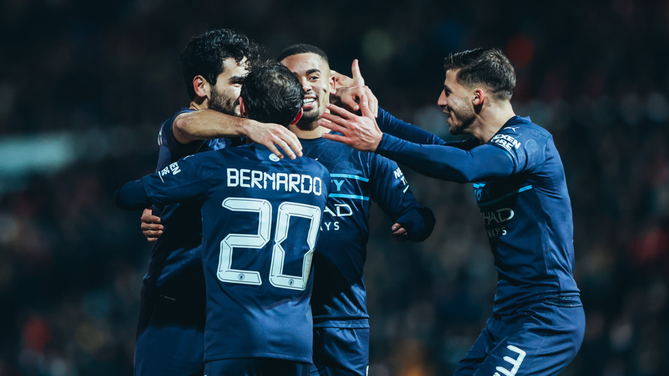 ALL SMILES : The players clearly enjoyed Gundogan's strike.