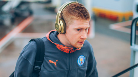 EAR WE GO: Kevin De Bruyne sported some nifty headphones ahead of departure