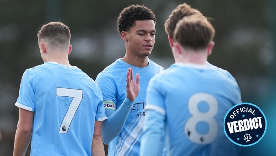 Players in Manchester City jerseys, numbered 7 and 8, wearing light blue kits with a logo indicating a team association.
