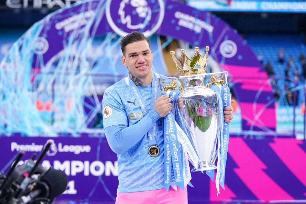 THREE CHEERS; Ederson and City celebrated a third Premier League title in four years in May 2021