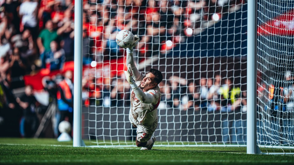 KEEP OUT : Ederson saves a penalty in the Community Shield victory over Manchester United