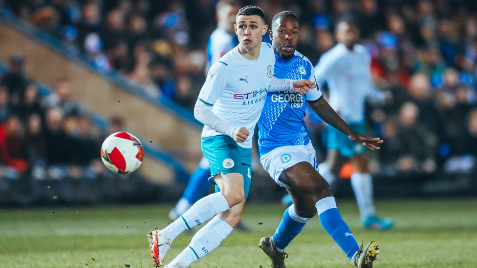 ON THE BALL : Foden gets involved early on.