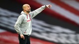 PEP TALK: The boss provides instructions from the touchline.
