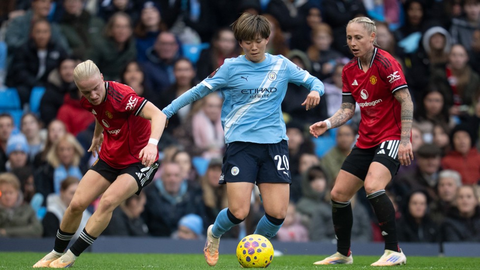 BATTLING IT OUT: Aoba Fujino looks to break forward